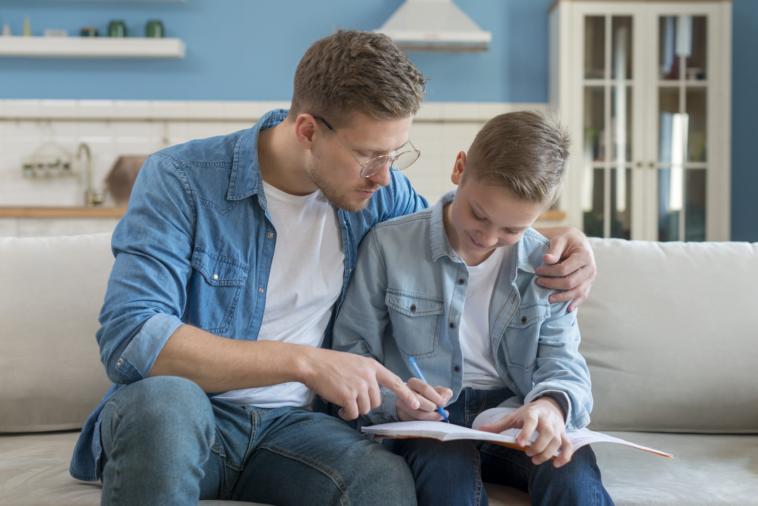 father son doing homework scaled